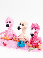 Mini Flamingo-Groep op strand